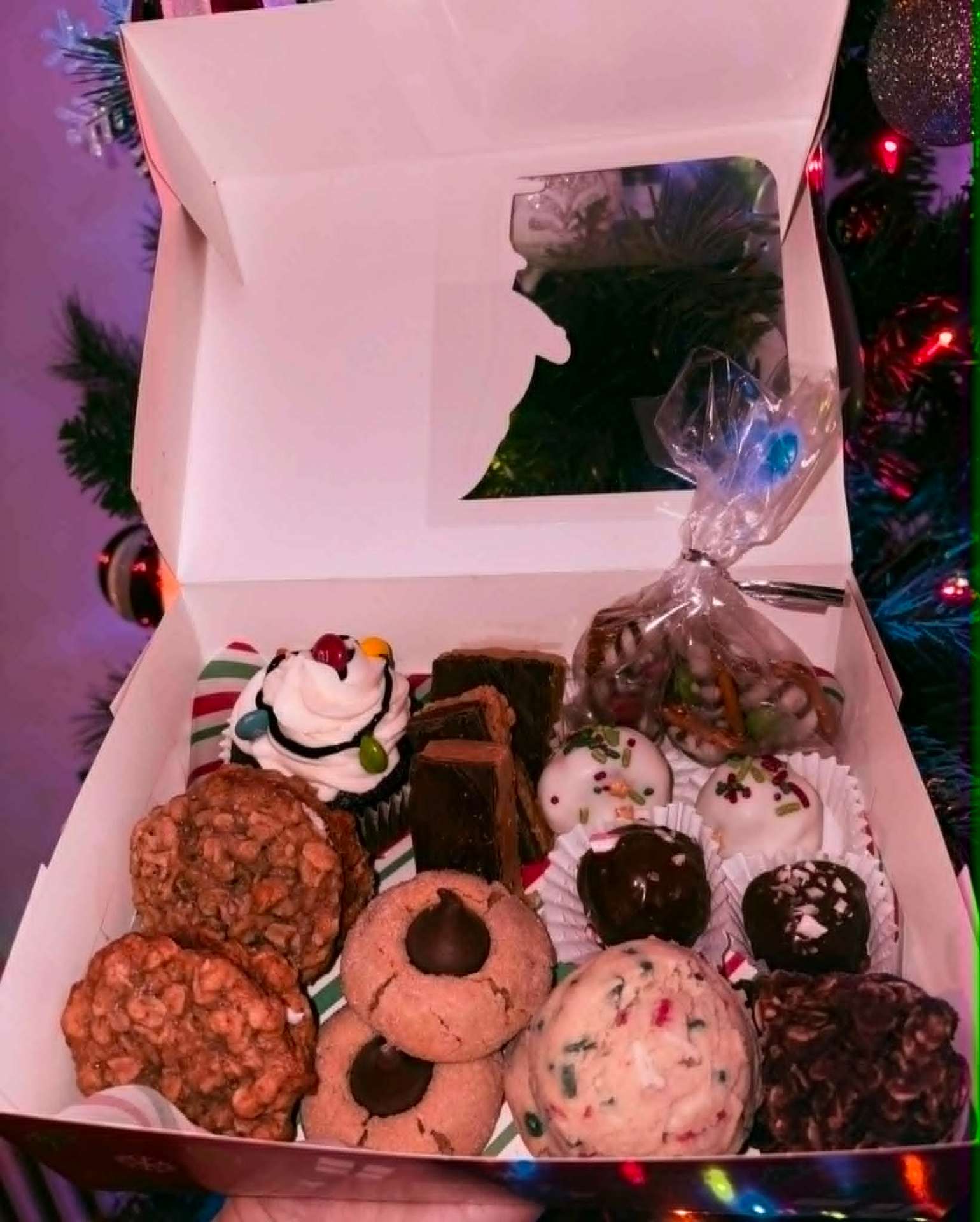 Holiday treat box with cookies, brownies, and truffles