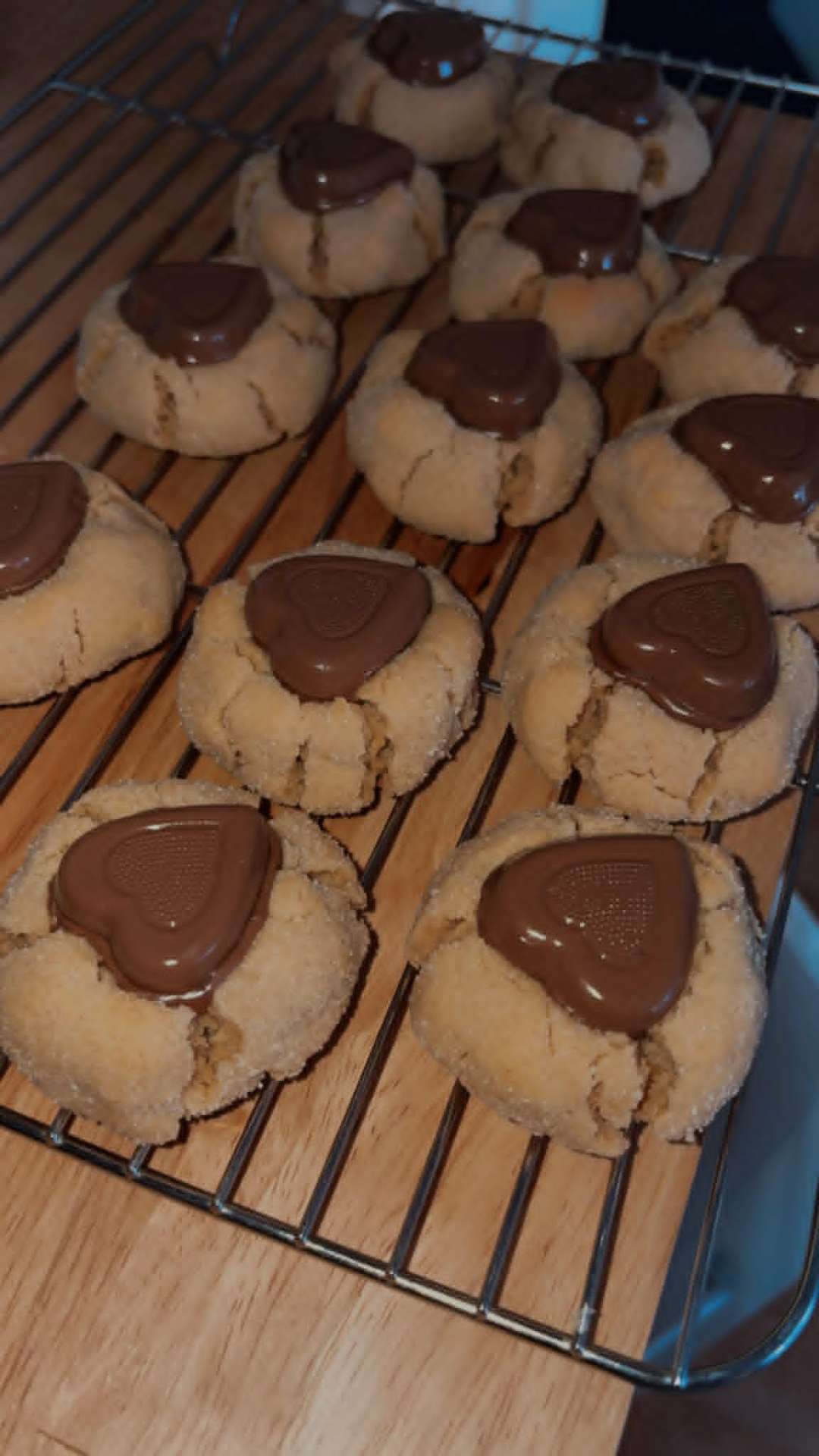 Peanut butter cookies topped with chocolate hearts