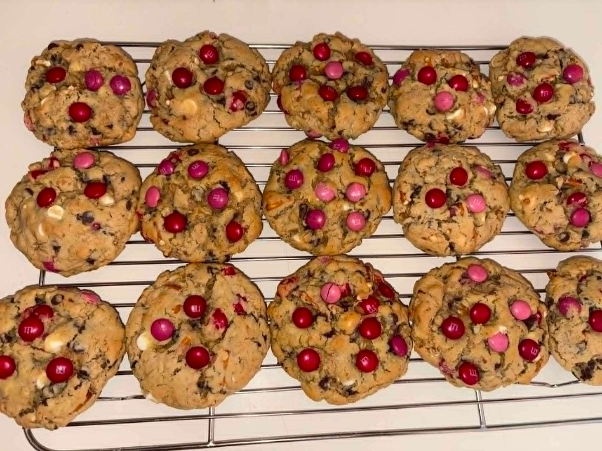Pink and red M&M loaded chocolate chip cookies